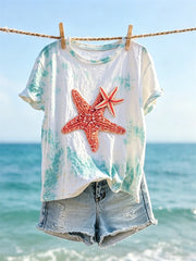 Kurzärmliges T-Shirt mit Seestern-Kunstdruck am Meer