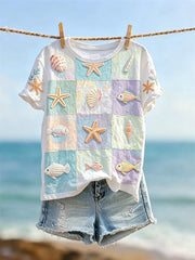 Damen-T-Shirt mit maritimer Tierwelt in Color-Block-Optik und Kurzärmeln