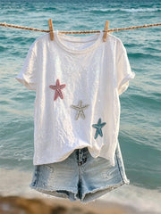Kurzarm-T-Shirt für Damen Seestern am Glitter Beach Art Print