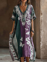Damenkleid mit gestreiftem Color-Blocking‑Design, floralem Schmetterlingsmuster und V-Ausschnitt