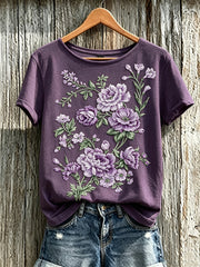 Lässiges T-Shirt für Damen mit violettem Blumenmuster und kurzen Ärmeln
