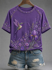 Damen-T-Shirt in Lila mit Blumen- und Kolibri-Print zur Sensibilisierung für die Alzheimer-Krankheit