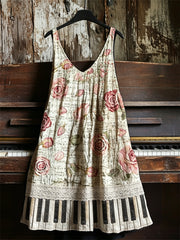 Damenkleid im Vintage-Stil mit Rosen-Notenblatt- und Klaviertasten-Print sowie V-Ausschnitt