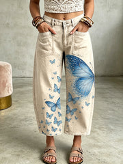 Damenhose mit Tier- und Schmetterlings-Print und Taschen
