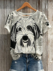 Damen-Fuzzy-T-Shirt mit Zeitungs- und Pfotenabdruck-Muster in Patchwork-Optik und Kurzärmeln