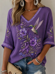 Damen-T-Shirt in Lila mit Blumen- und Kolibri-Print, halbarm, V-Ausschnitt, zur Sensibilisierung für die Alzheimer-Krankheit
