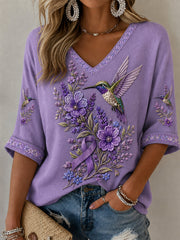 Damen-T-Shirt in Lila mit Blumen- und Kolibri-Print, halbarm, V-Ausschnitt, zur Sensibilisierung für die Alzheimer-Krankheit