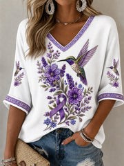 Damen-T-Shirt in Lila mit Blumen- und Kolibri-Print, halbarm, V-Ausschnitt, zur Sensibilisierung für die Alzheimer-Krankheit