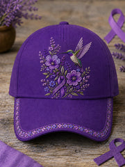 Unisex-Mütze in Lila mit Blumen- und Kolibri‑Muster zur Sensibilisierung für die Alzheimer‑Krankheit