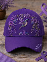 Unisex-Mütze in Lila mit Blumen- und Kolibri‑Muster zur Sensibilisierung für die Alzheimer‑Krankheit