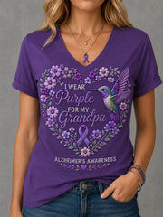 Damen-T-Shirt mit violetter Blumen- und Kolibri-Print-Aufschrift zur Sensibilisierung für Alzheimer, V-Ausschnitt