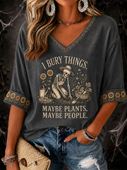 Damen-Halloween-Floral‑Freizeit‑T‑Shirt mit dem Spruch „Ich begrabe Dinge, vielleicht Pflanzen, vielleicht Menschen“