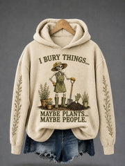 Damen-Halloween-Kapuzenpullover mit Blumenmuster, lässig und regular fit, mit dem Spruch „Ich begrabe Dinge, vielleicht Pflanzen, vielleicht Menschen“