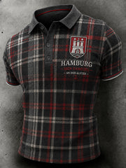Herren-Poloshirt mit kurzen Ärmeln und urbanem, erinnerungsträchtigem Grafikdruck