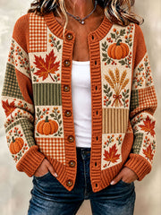 Damen-Strickjacke im Cardigan-Stil mit Herbstmotiv aus Ahornblättern und Kürbissen